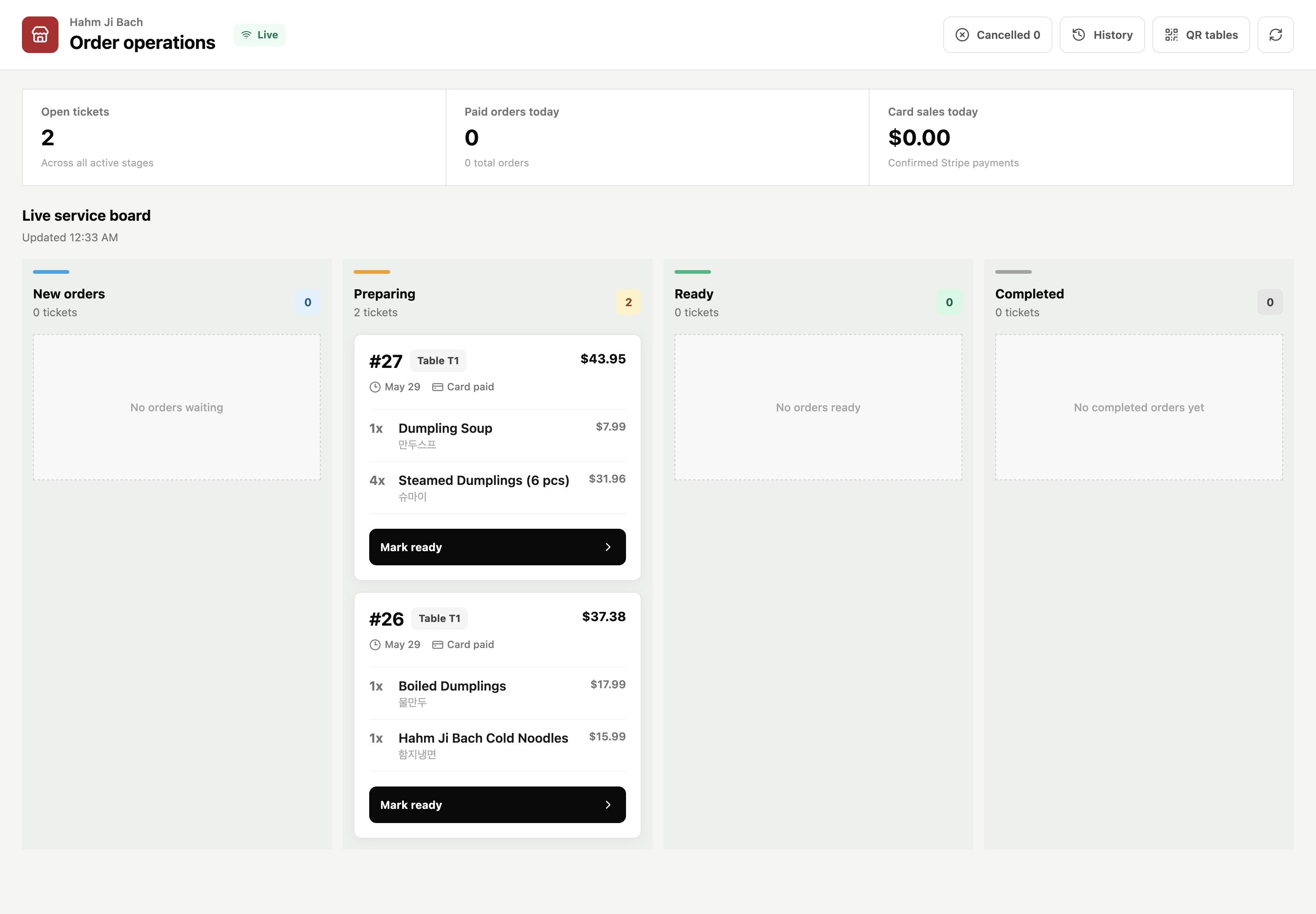 Staff order board with stored test orders, payment status, table identity, and preparation controls
